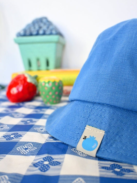 "Blueberry & Ant" Linen bucket hat. Designed by HO HOS HOLE IN THE WALL brand. Made in NYC.